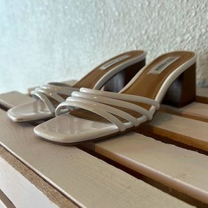 White strapless Steve Madden heels